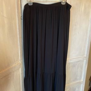 Knit skirt with wide ruffle hem.